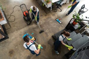 top view of cleaning company team cleaning modern office